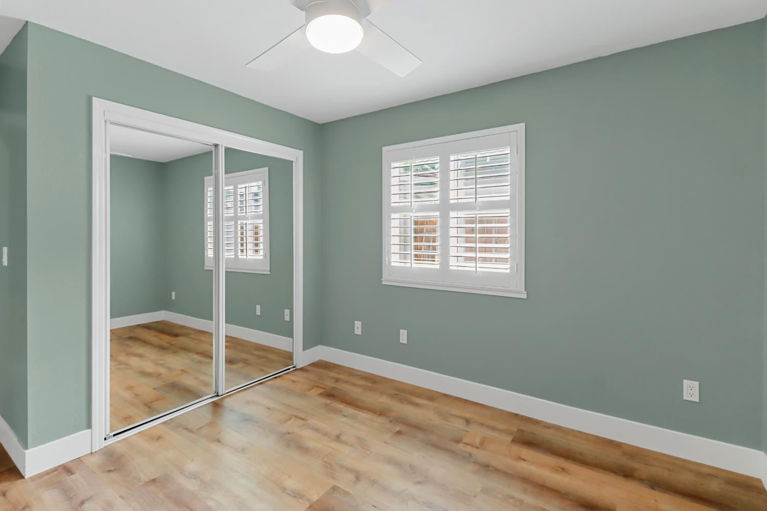 567 I Street Lincoln, CA 95648 - Photo 29 of 53 a view of an empty room with window and wooden floor