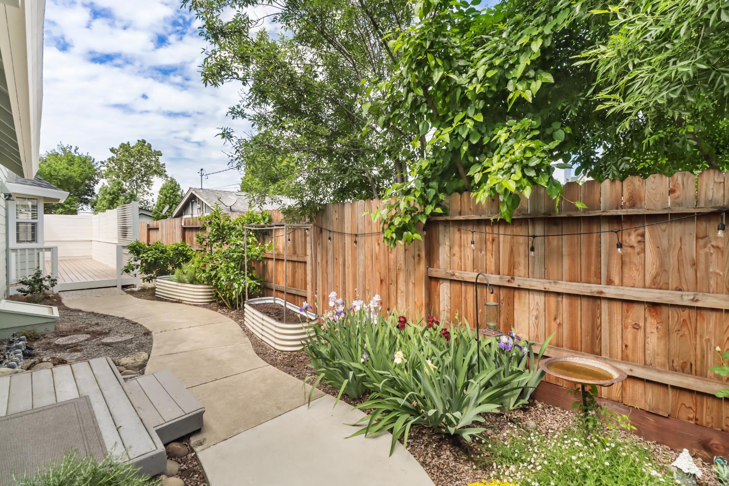 567 I Street Lincoln, CA 95648 - Photo 43 of 53 a backyard of a house with lots of green space