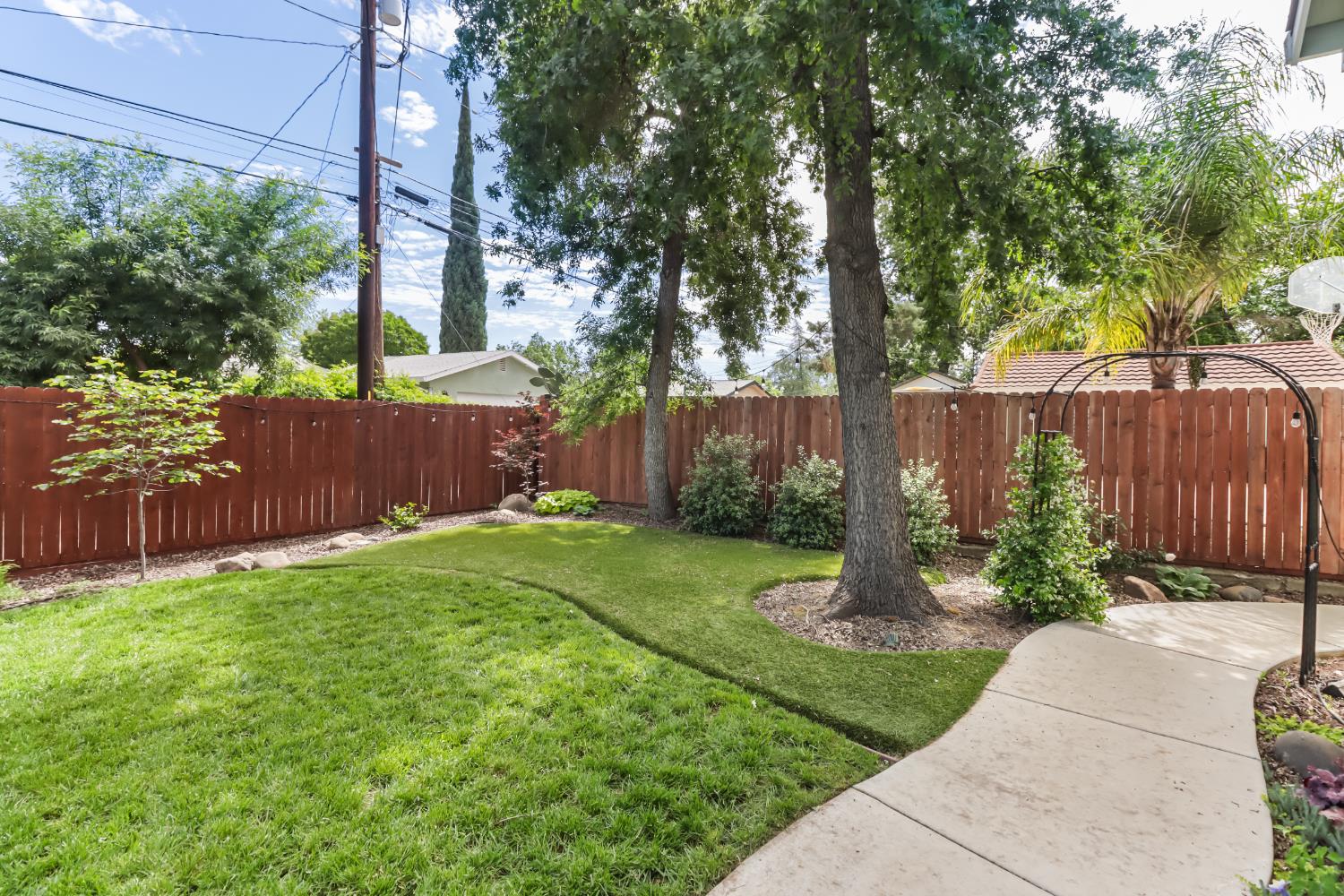 567 I Street Lincoln, CA 95648 - Photo 51 of 53 a view of a backyard with tree s