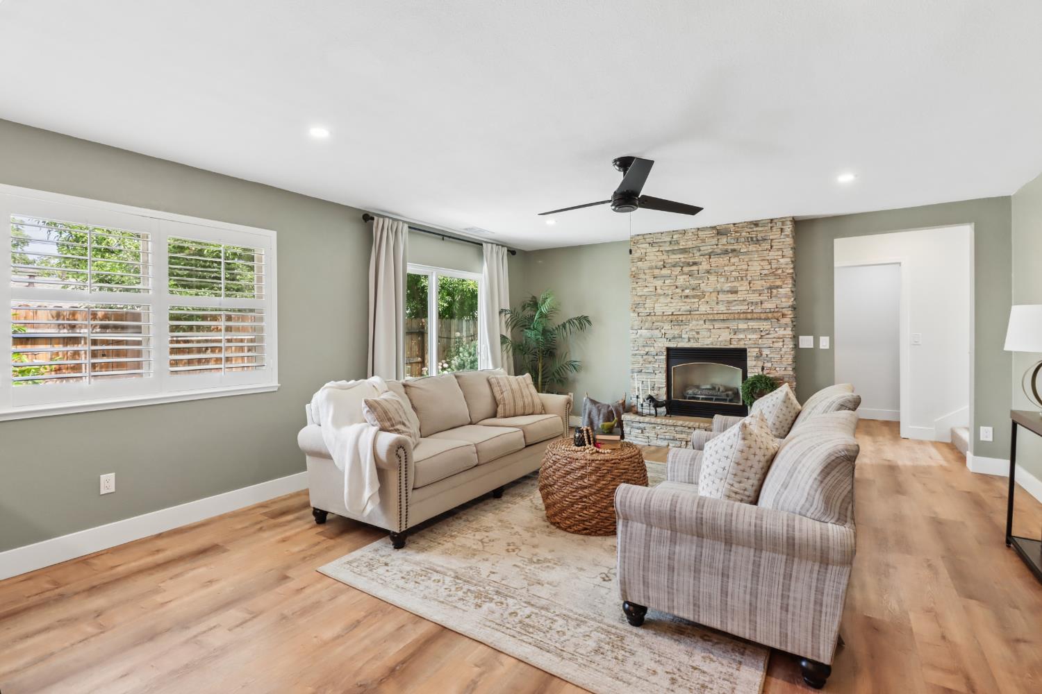 567 I Street Lincoln, CA 95648 - Photo 8 of 53 a living room with furniture and a fireplace