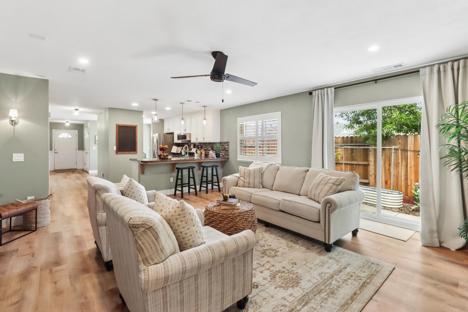 567 I Street Lincoln, CA 95648 - Photo 9 of 53 a living room with furniture and a large window