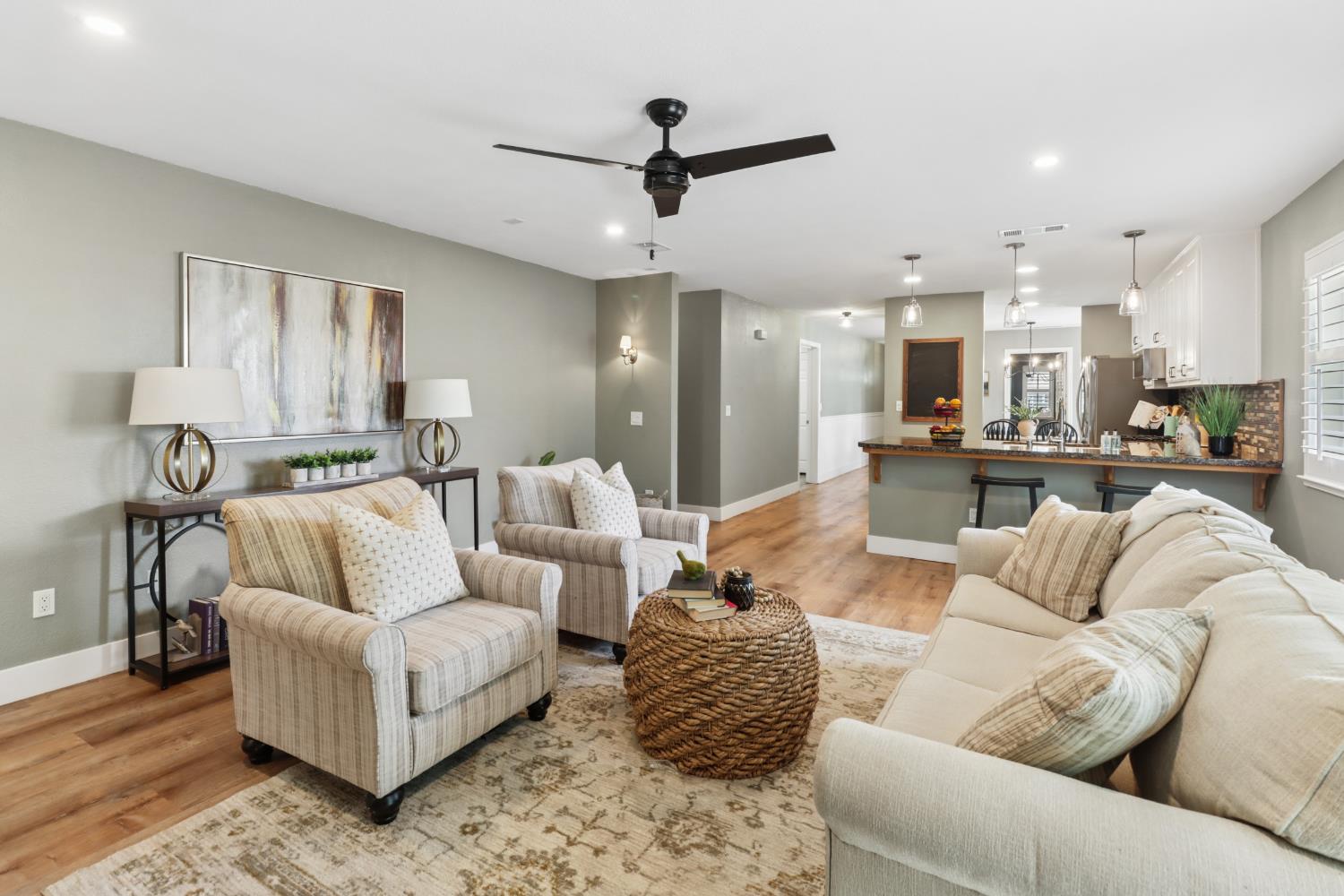 567 I Street Lincoln, CA 95648 - Photo 10 of 53 a living room with furniture and a view of kitchen