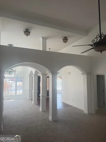 a view of a hallway with entryway