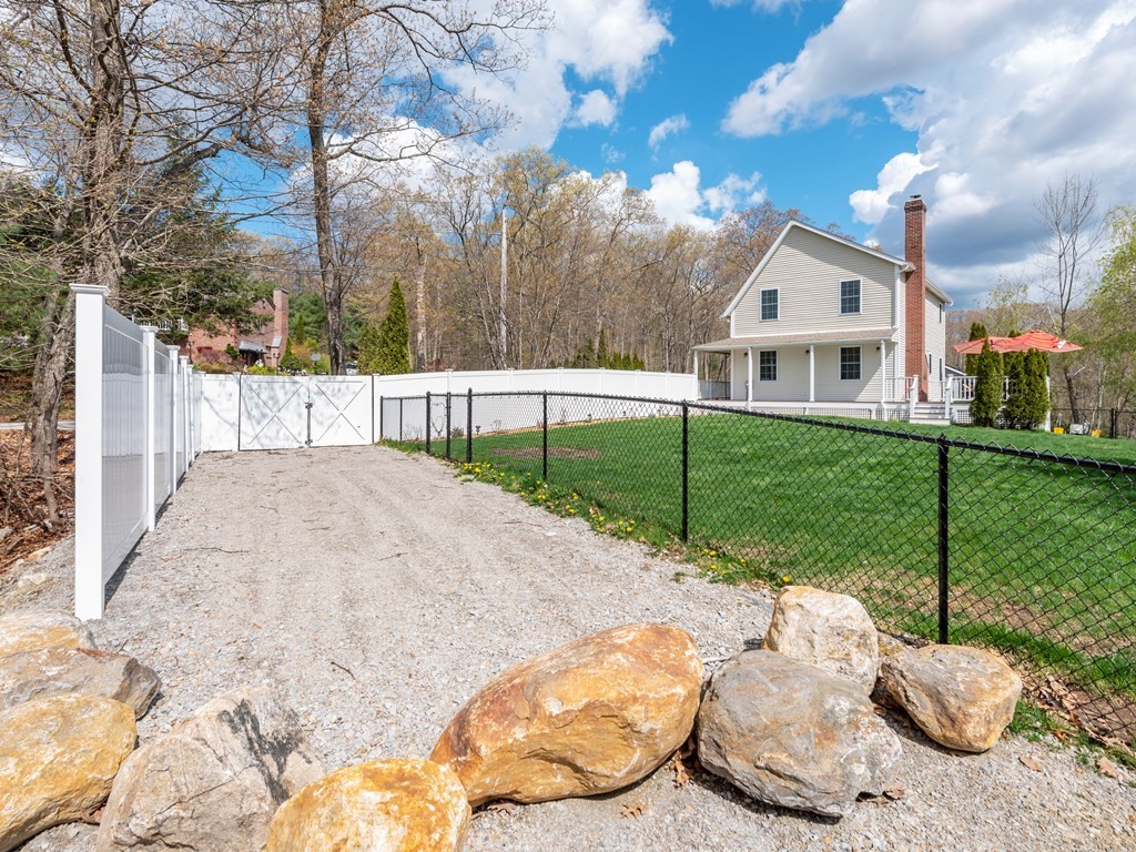 50 Sawmill Road Dudley, MA 01571 - Photo 6 of 40 a view of backyard of house
