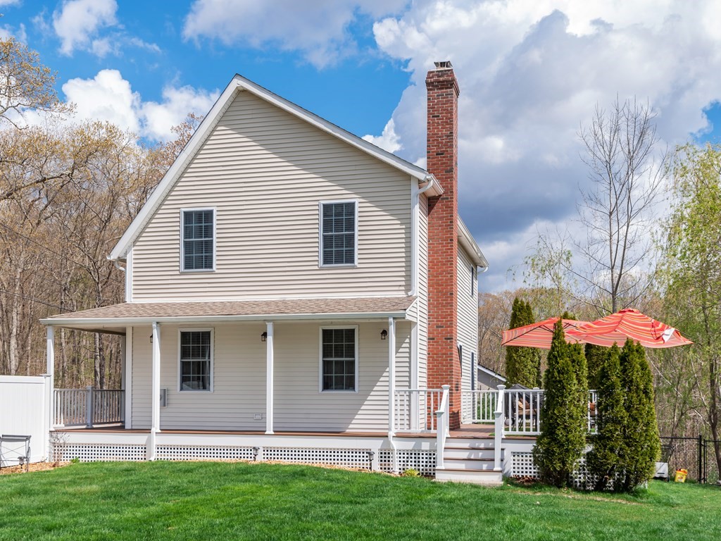 50 Sawmill Road Dudley, MA 01571 - Photo 7 of 40 a front view of a house with a yard