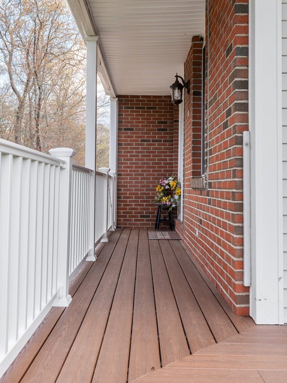 50 Sawmill Road Dudley, MA 01571 - Photo 8 of 40 a view of wooden balcony