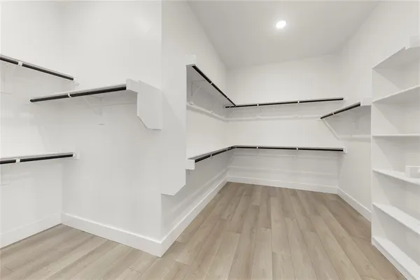 a bathroom with a sink a mirror and a bathtub