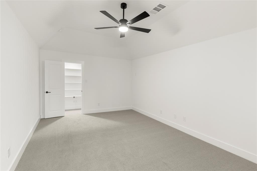 981 Georgetown Place Prosper, TX 75078 - Photo 23 of 30 an empty room