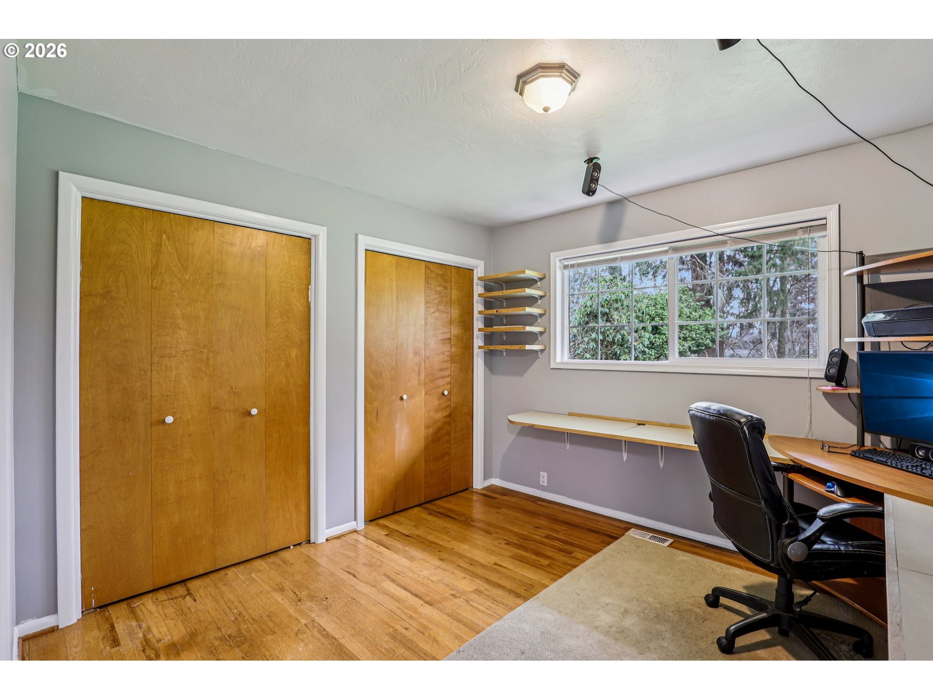 155 Sunset Boulevard St. Helens, OR 97051 - Photo 20 of 44 a view of a workspace with furniture and a window