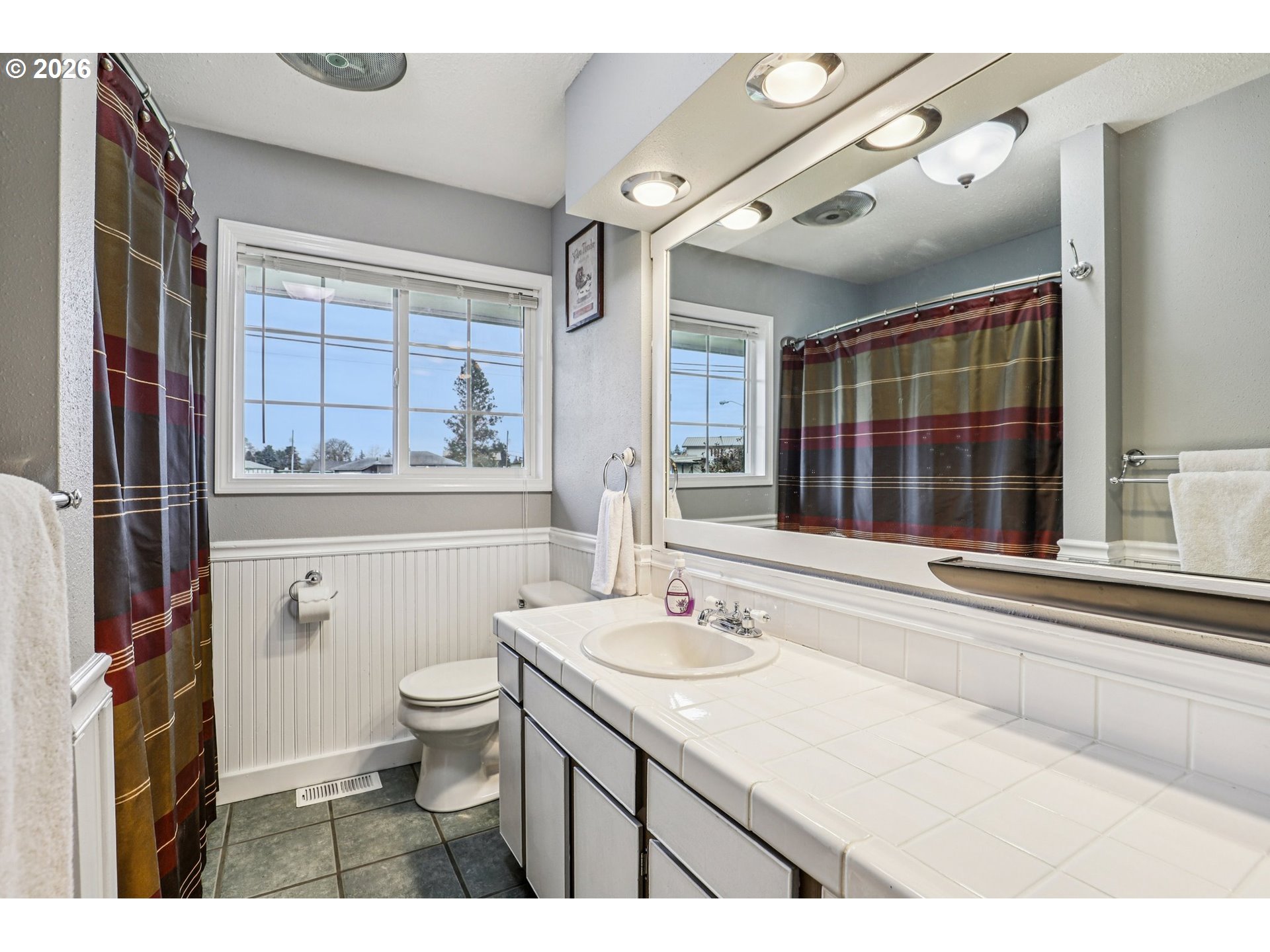 155 Sunset Boulevard St. Helens, OR 97051 - Photo 28 of 44 a bathroom with a sink vanity mirror and toilet