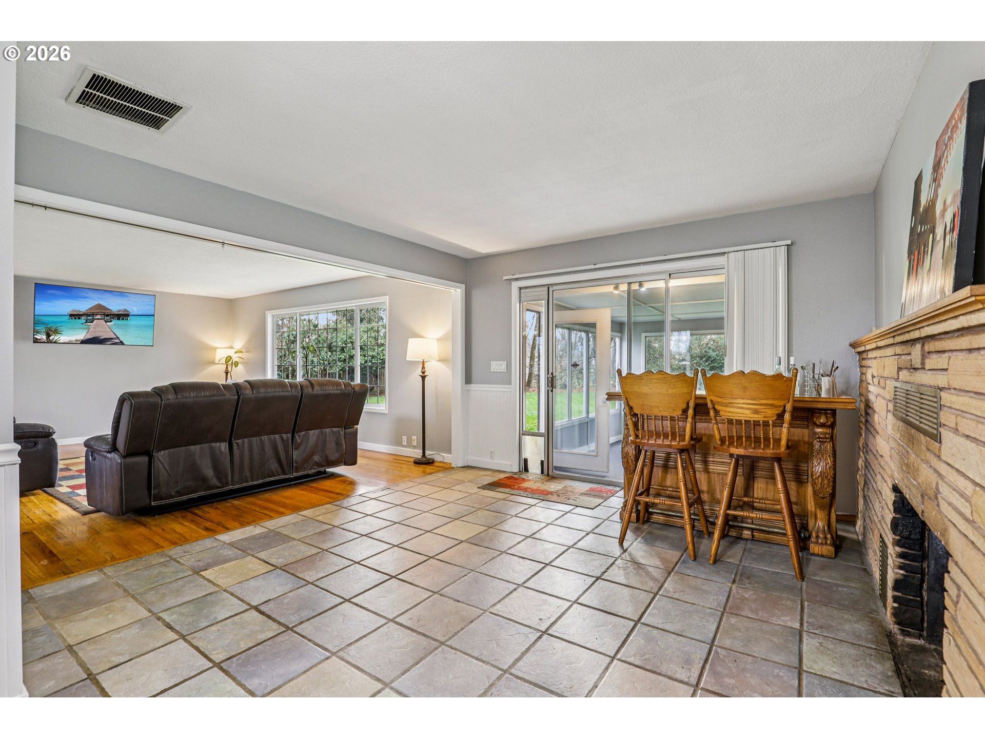 155 Sunset Boulevard St. Helens, OR 97051 - Photo 32 of 44 a living room with furniture a rug and a dining table