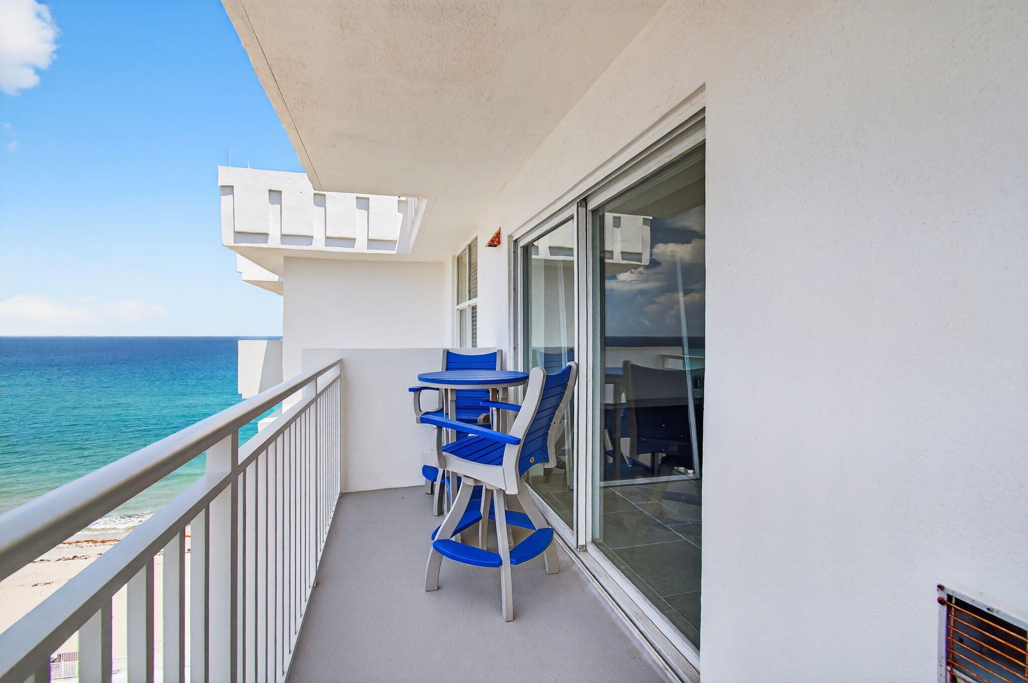 4511 South Ocean Boulevard, Unit 1004 Highland Beach, FL 33487 - Photo 2 of 76 a view of staircase with furniture and fan
