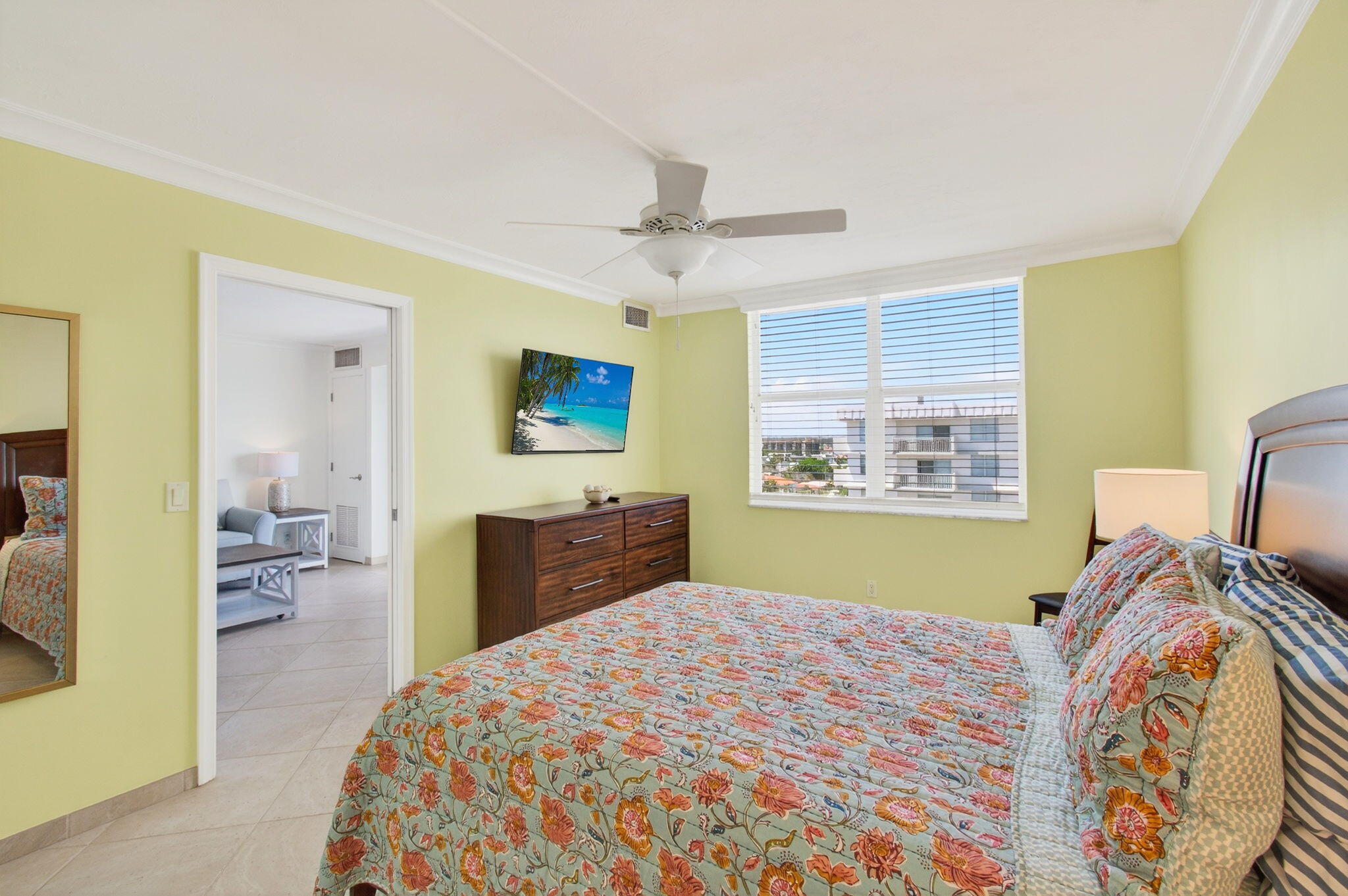 4511 South Ocean Boulevard, Unit 1004 Highland Beach, FL 33487 - Photo 25 of 76 a bedroom with a bed and wooden floor