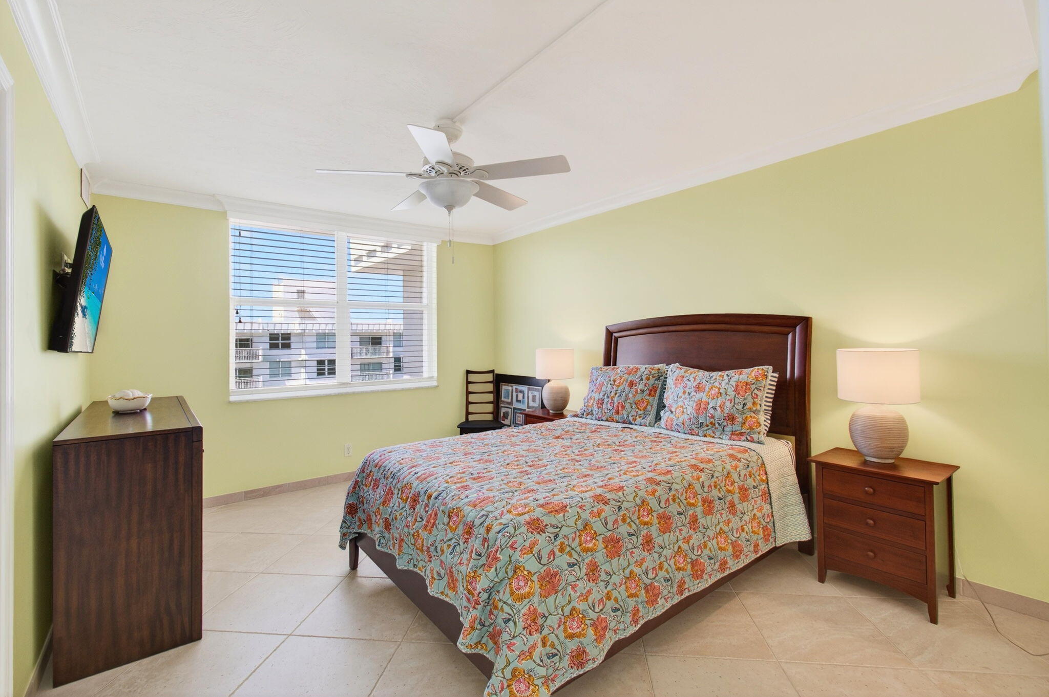 4511 South Ocean Boulevard, Unit 1004 Highland Beach, FL 33487 - Photo 26 of 76 a bedroom with a bed and window