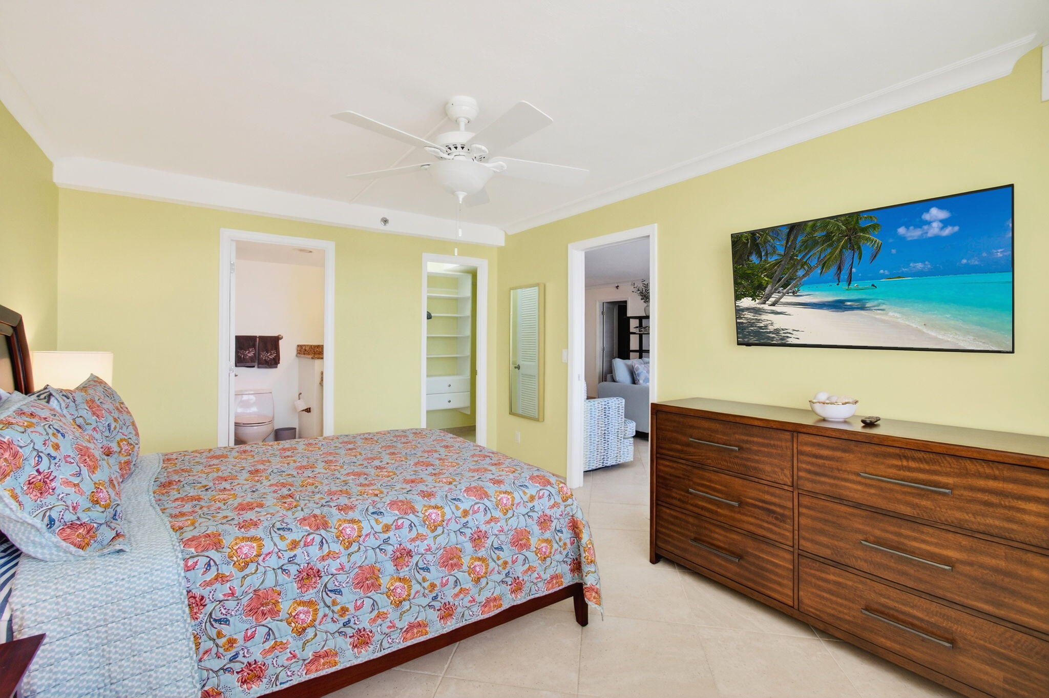 4511 South Ocean Boulevard, Unit 1004 Highland Beach, FL 33487 - Photo 29 of 76 a bedroom with a bed and a dresser in it