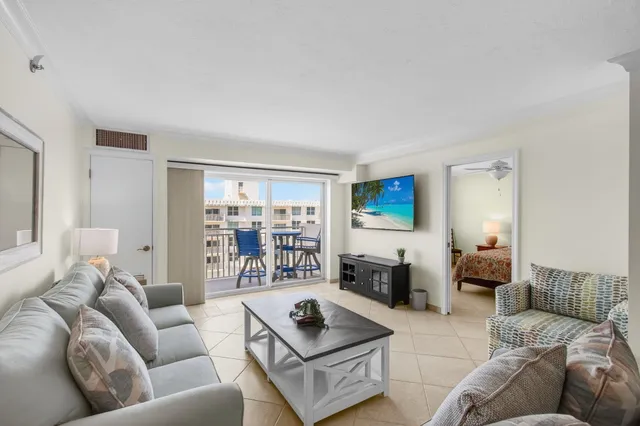 a view of parking garage with cars