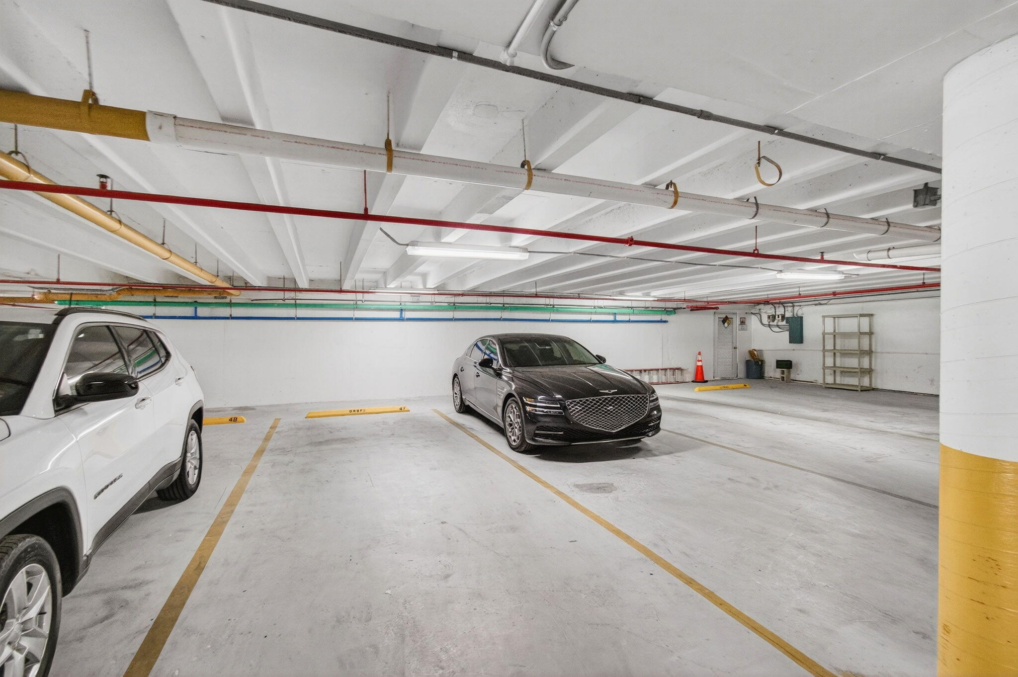4511 South Ocean Boulevard, Unit 1004 Highland Beach, FL 33487 - Photo 46 of 76 a view of parking garage with cars