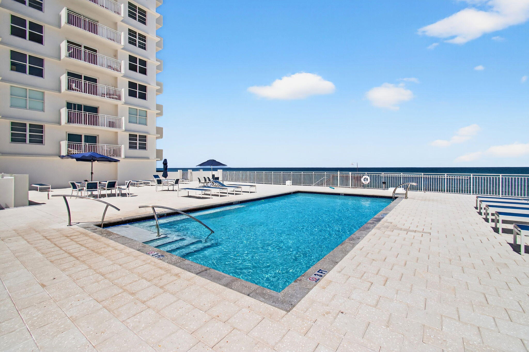 4511 South Ocean Boulevard, Unit 1004 Highland Beach, FL 33487 - Photo 49 of 76 a view of swimming pool with outdoor seating and a terrace