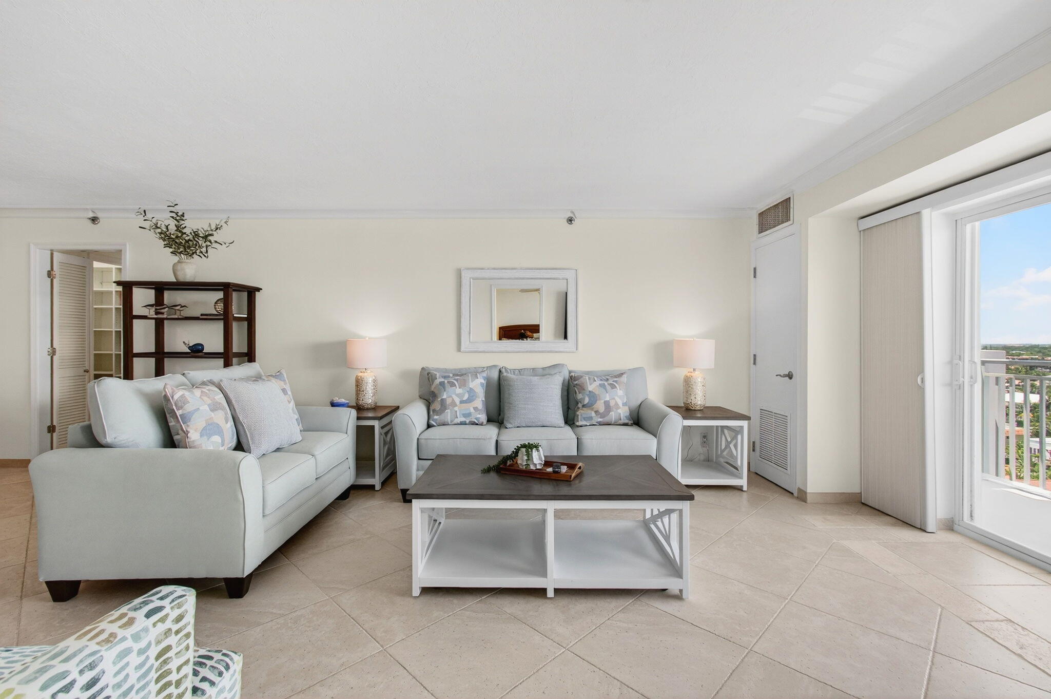 4511 South Ocean Boulevard, Unit 1004 Highland Beach, FL 33487 - Photo 5 of 76 a living room with furniture and a window