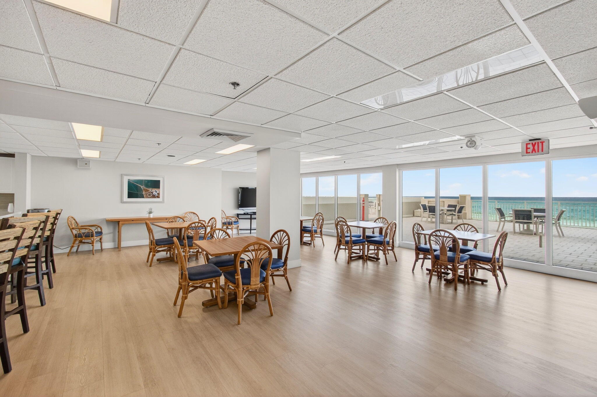 4511 South Ocean Boulevard, Unit 1004 Highland Beach, FL 33487 - Photo 57 of 76 a view of a dining room with furniture window and wooden floor