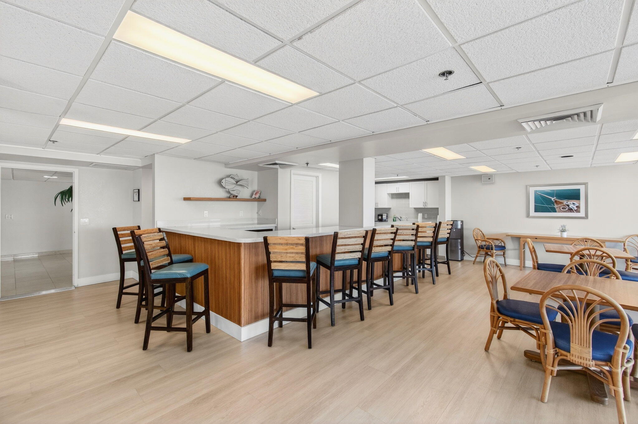 4511 South Ocean Boulevard, Unit 1004 Highland Beach, FL 33487 - Photo 58 of 76 a view of a dining room with furniture and wooden floor