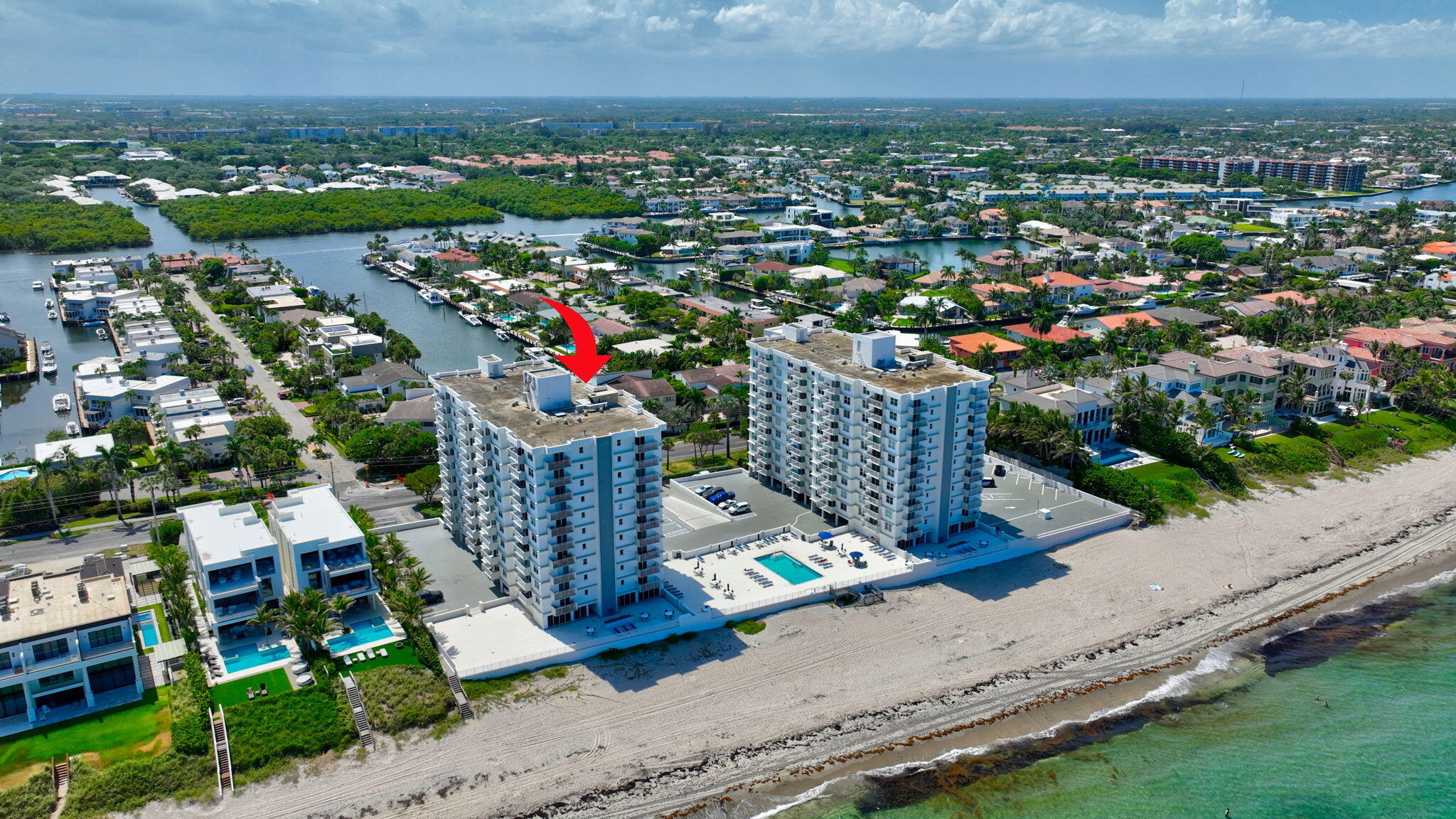 4511 South Ocean Boulevard, Unit 1004 Highland Beach, FL 33487 - Photo 66 of 76 an aerial view of a houses with outdoor space and street view