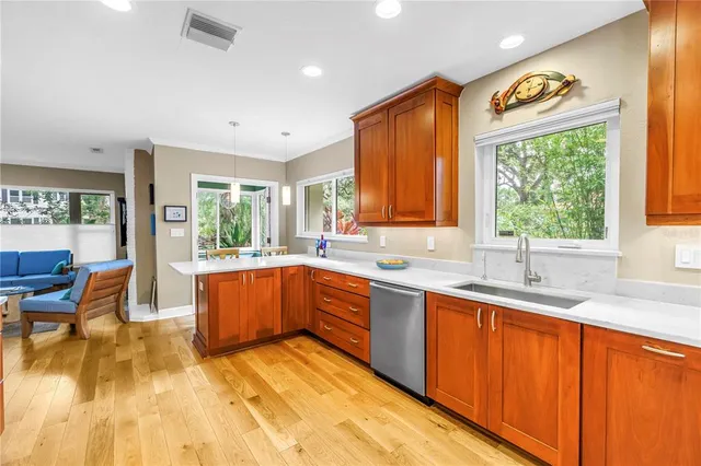 a spacious bathroom with a double vanity sink and a large mirror
