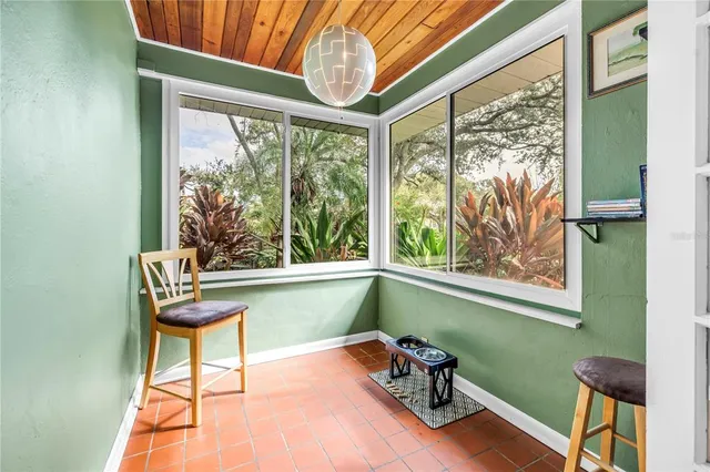 a backyard of a house with seating space