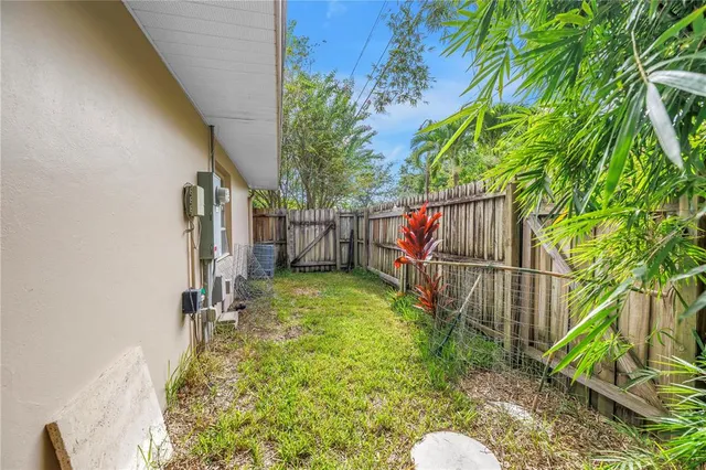 a view of a park with large trees