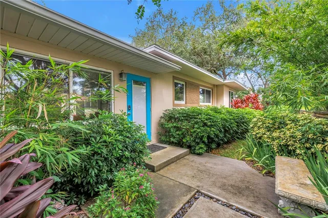 a view of a house with a garden