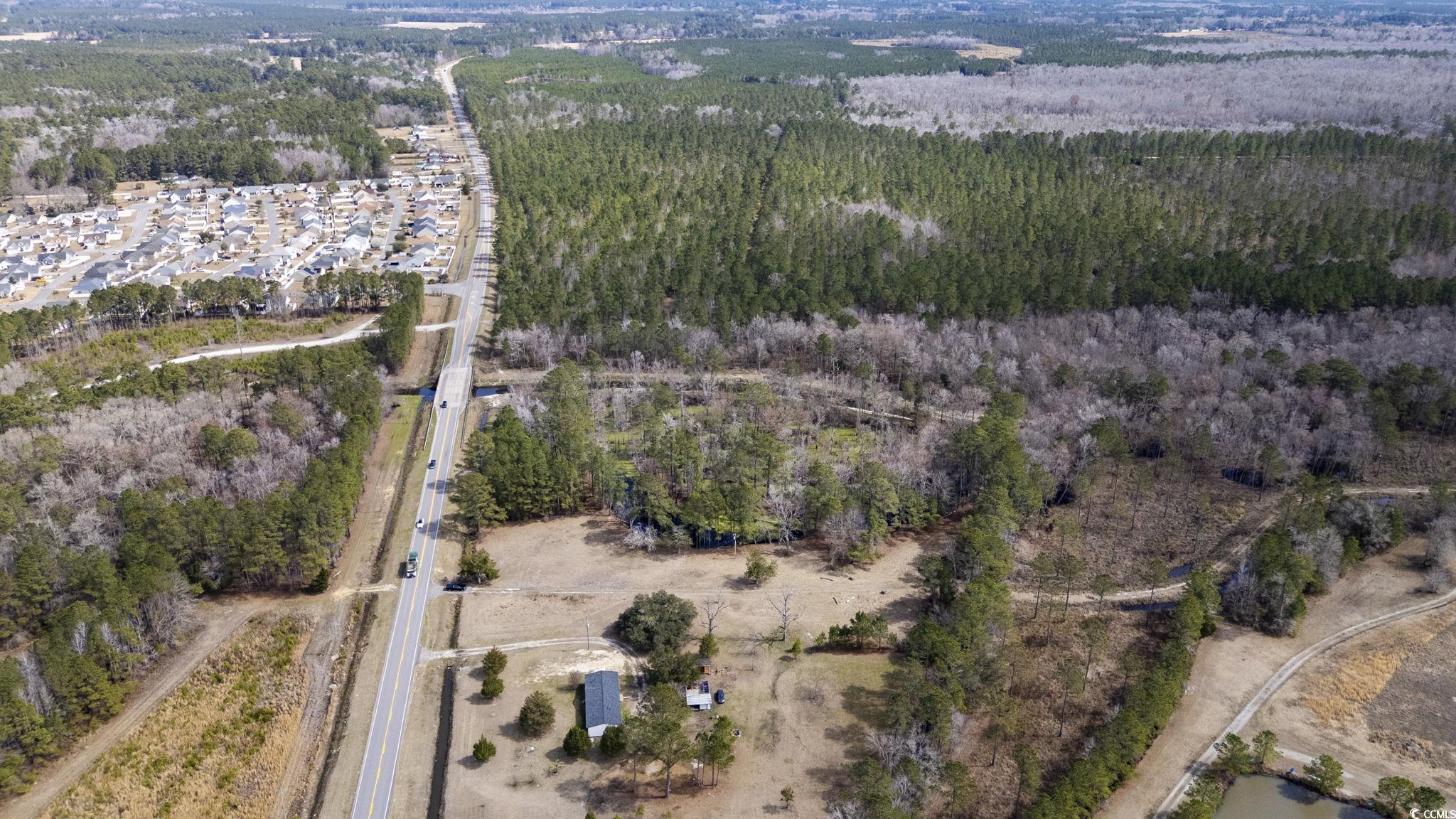 8224 Highway 905 Longs, SC 29568 - Photo 8 of 14 Birds eye view of property with a view of trees