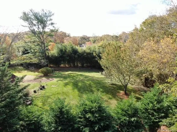 a view of outdoor space and a yard