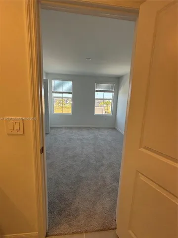 a front view of a house with garage