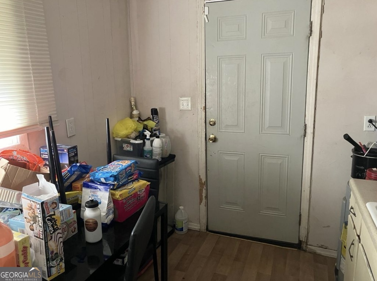 212 Whitehead Street Thomson, GA 30824 - Photo 3 of 9 a room with storage and utility