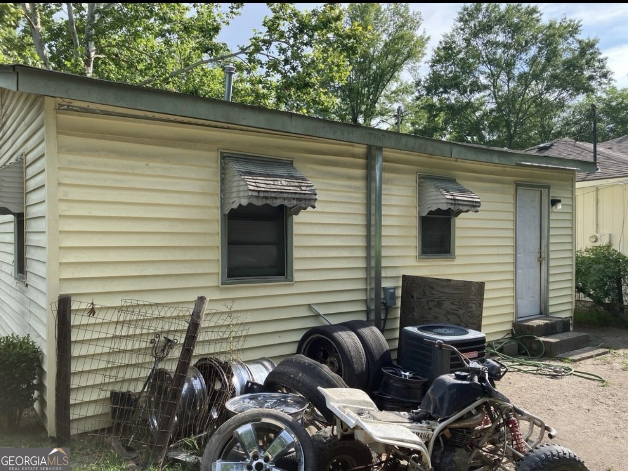 212 Whitehead Street Thomson, GA 30824 - Photo 9 of 9 a view of backyard from deck