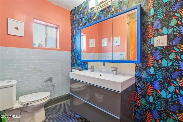 an aerial view of a city with lots of residential buildings