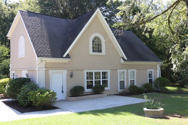 355 Bass Road Macon, GA 31210 - Photo 1 of 24 a view of a house with a yard