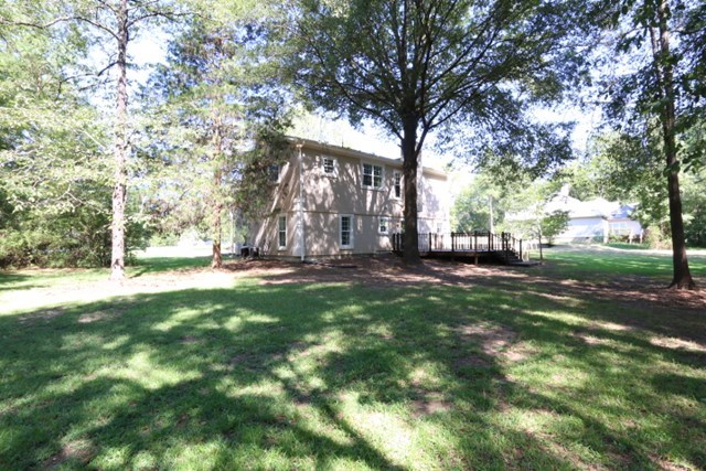 355 Bass Road Macon, GA 31210 - Photo 21 of 24 a view of backyard with tree