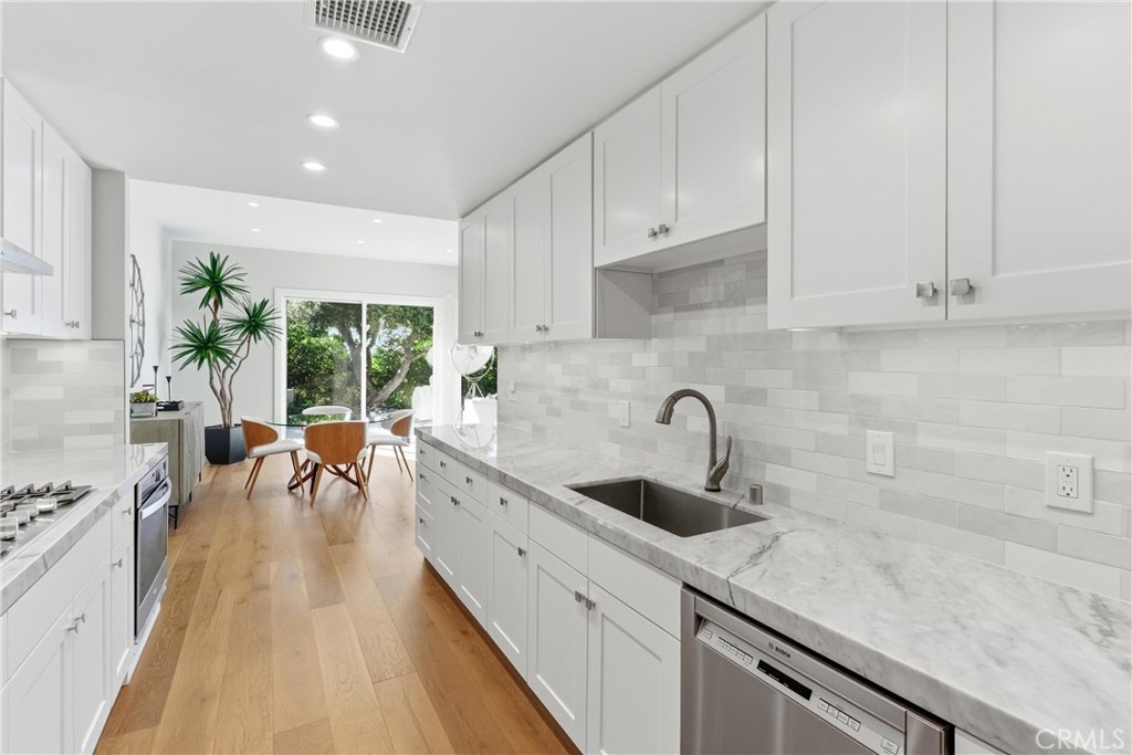 3 Rue Cannes Newport Beach, CA 92660 - Photo 8 of 46 Open living space flows effortlessly toward the kitchen and entry areas, creating an ideal layout for everyday living.