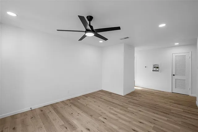 a view of a big room with wooden floor