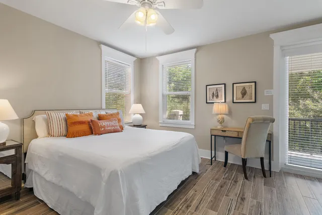 a bedroom with a bed and a table