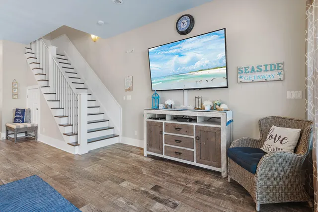 a view of workspace with furniture and stairs