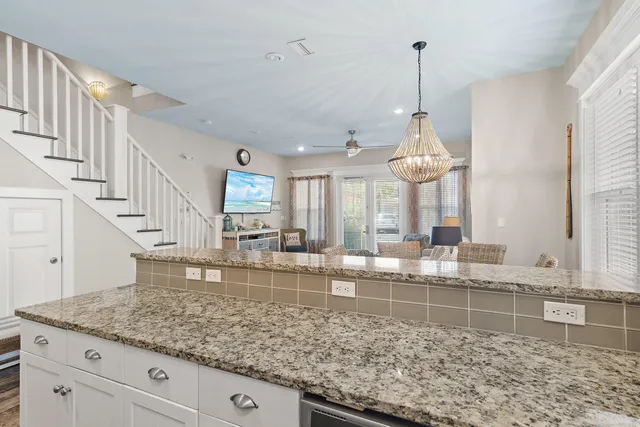 a view of a kitchen and living room