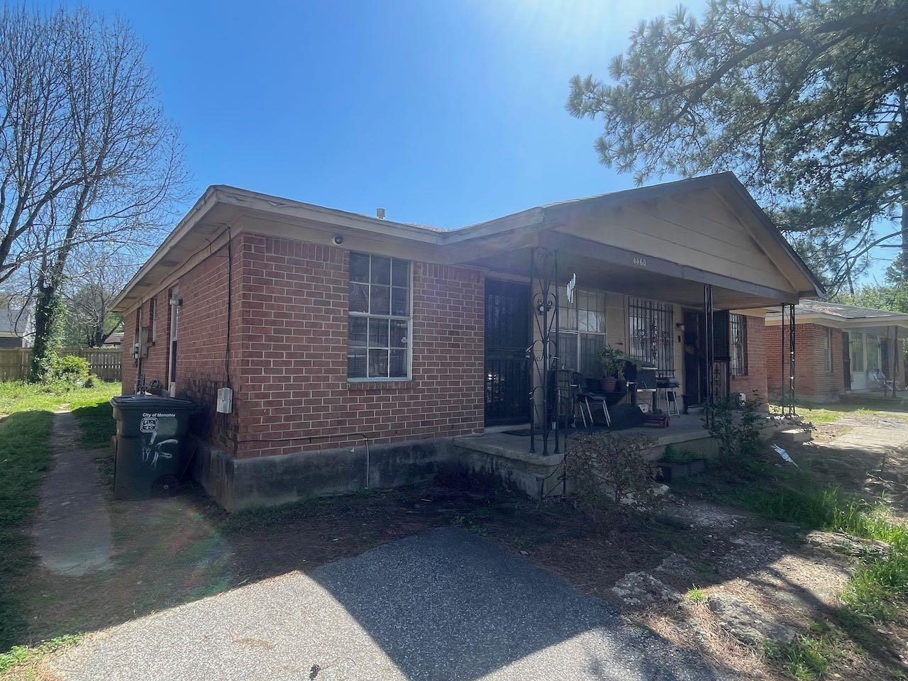 4460 Sumners Wells Road Memphis, TN 38118 - Photo 4 of 9 a backyard of a house with yard barbeque oven and outdoor seating