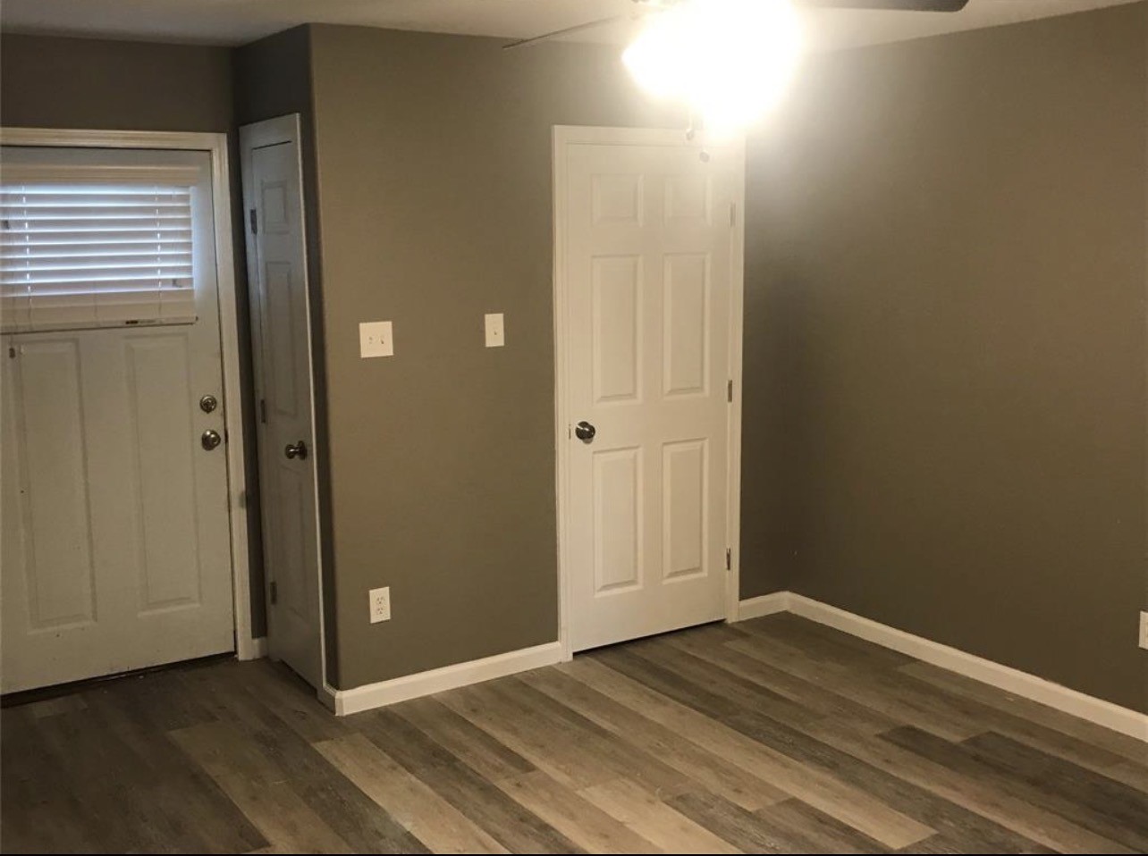 2515 Jackson La Marque, TX 77568 - Photo 11 of 19 an empty room with wooden floor and closet