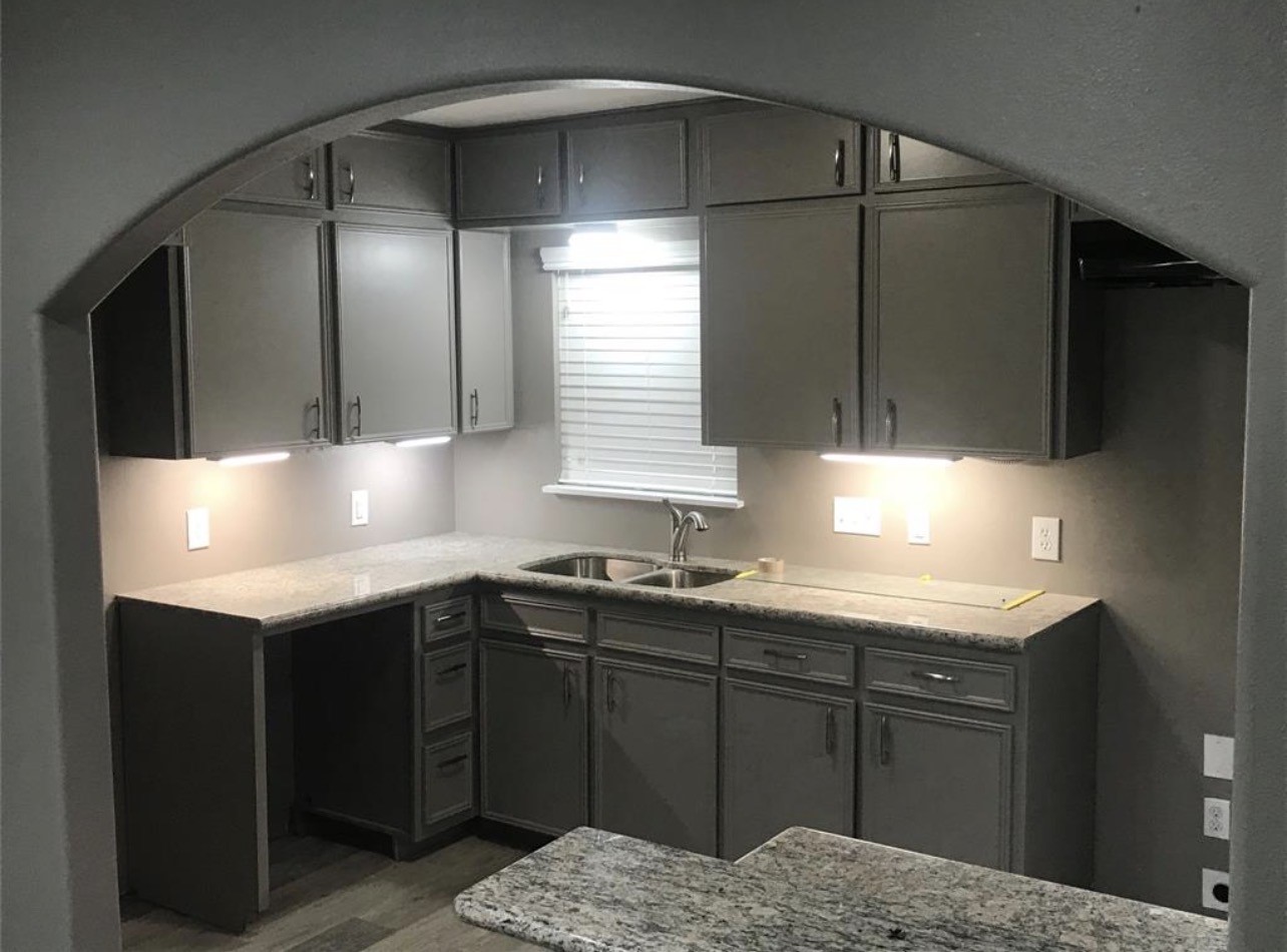 2515 Jackson La Marque, TX 77568 - Photo 2 of 19 a kitchen with a sink and cabinets