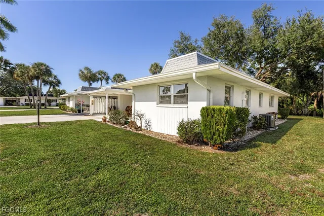a view of outdoor space with deck and tree