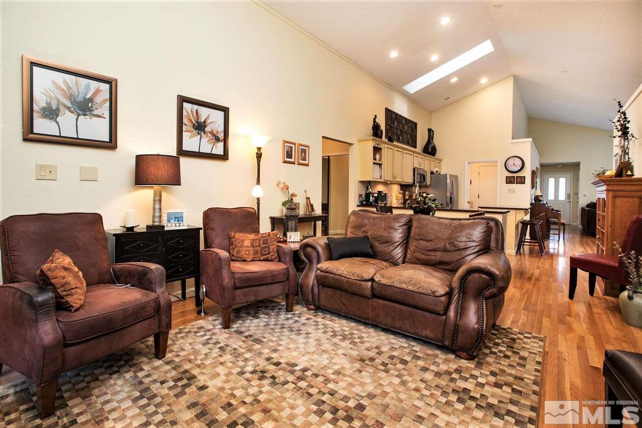145 Riverhaven Place Reno, NV 89519 - Photo 7 of 23 a living room with furniture and a couch