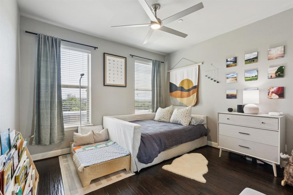 722 East 1st Street Fort Worth, TX 76102 - Photo 19 of 25 Spacious secondary bedroom features a walk-in closet and an en suite bathroom.