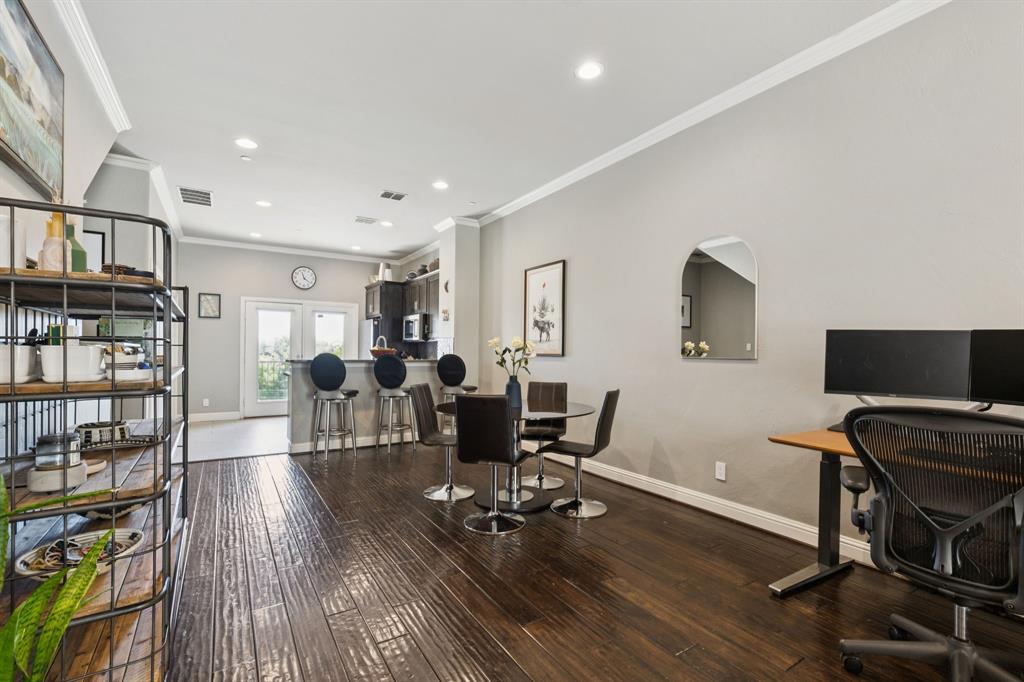 722 East 1st Street Fort Worth, TX 76102 - Photo 7 of 25 The gorgeous dark flooring and the light color palette provides the perfect backdrop for your new home.